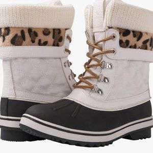 Global Win snow boots. Brand new and never worn. Smoke and pet free home.